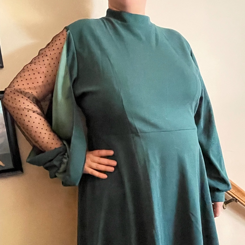 Forest green skater dress with mesh sleeve detail